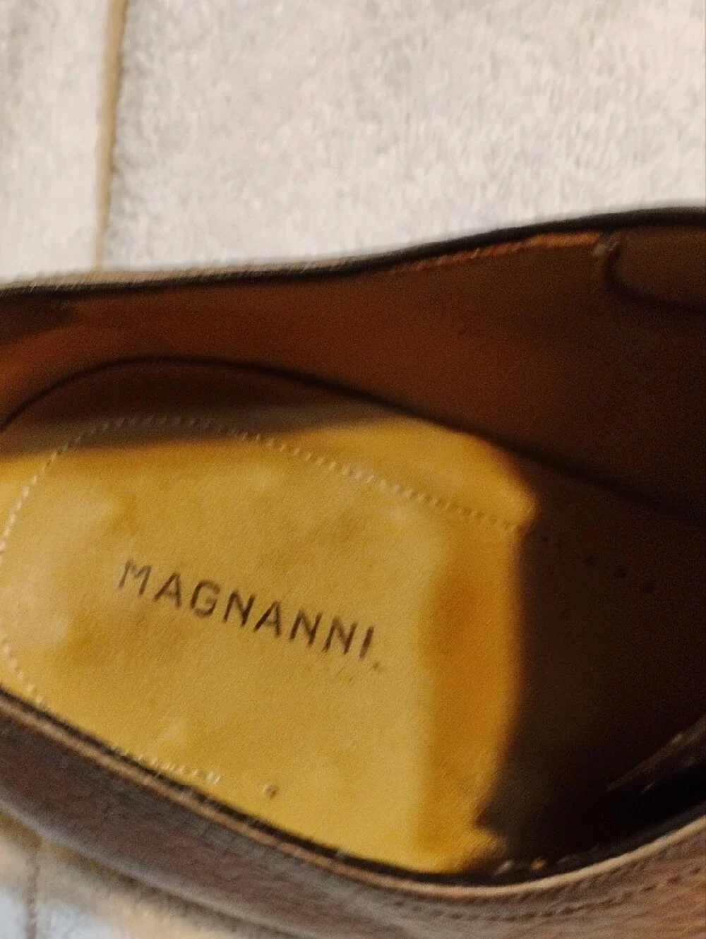 Magnanni refined leather